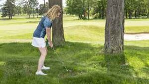 woman golf stroke